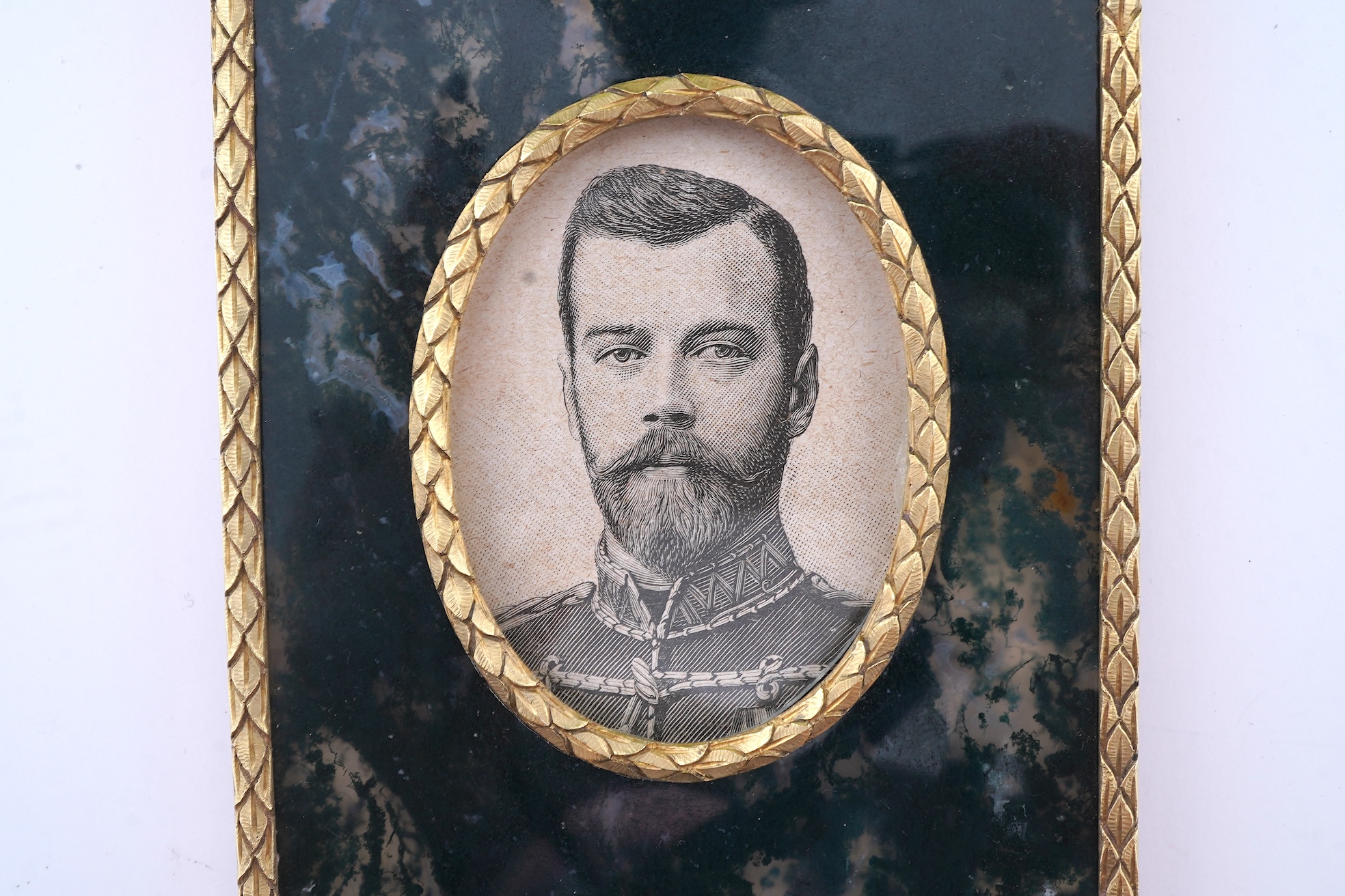 A gold and moss agate photo frame, 20th century